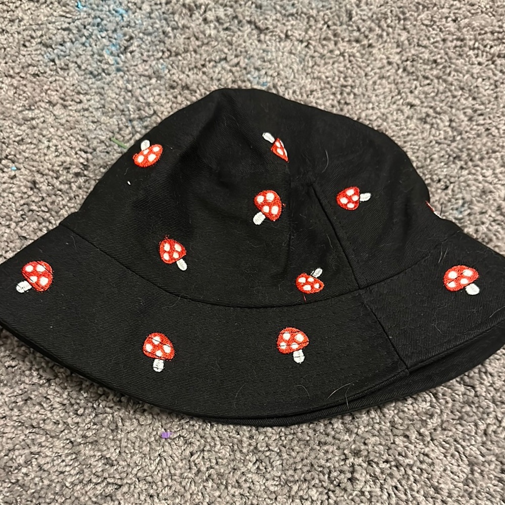 Black Bucket Hat with Red Mushroom Embroidery from hot topic women's